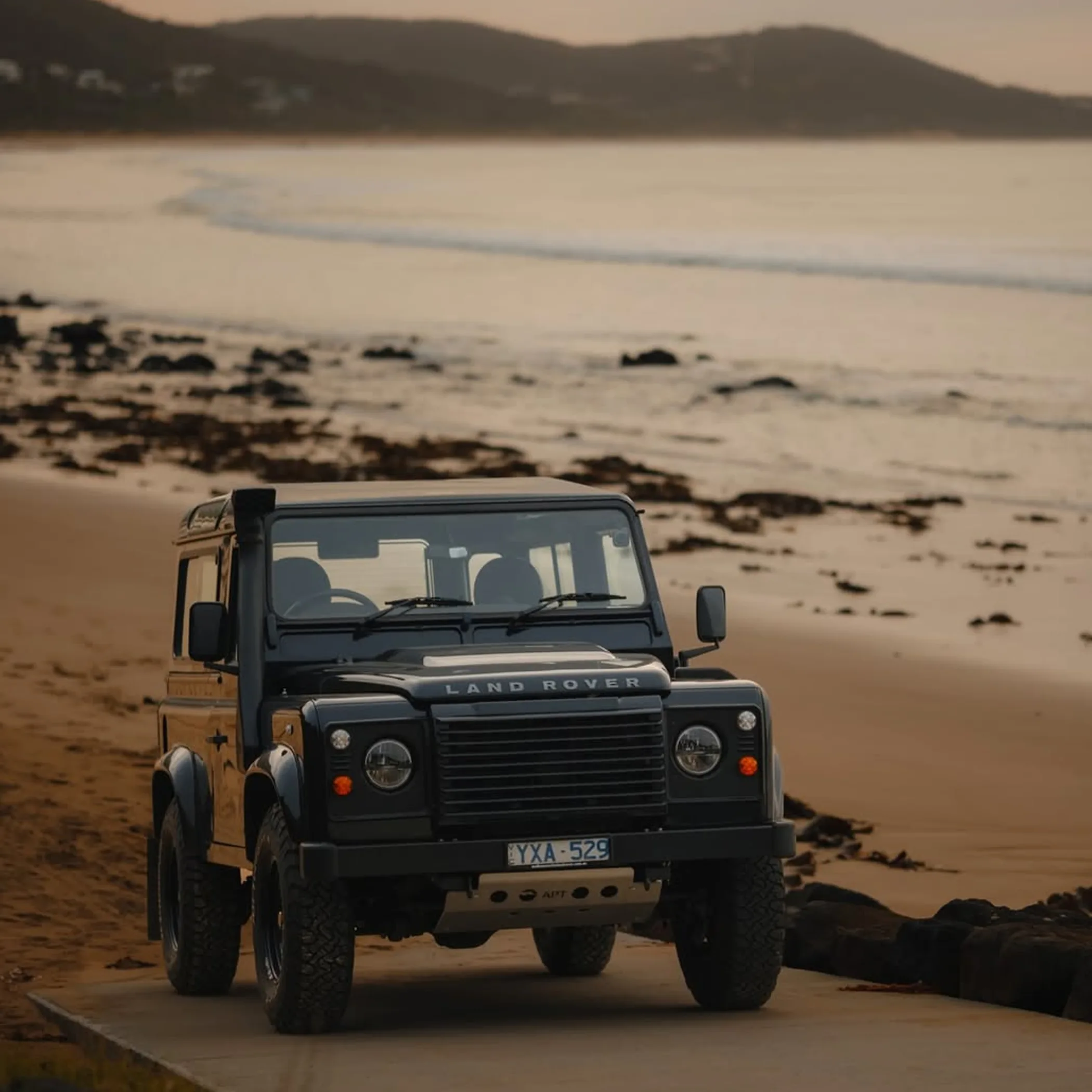 car parked on coastal road