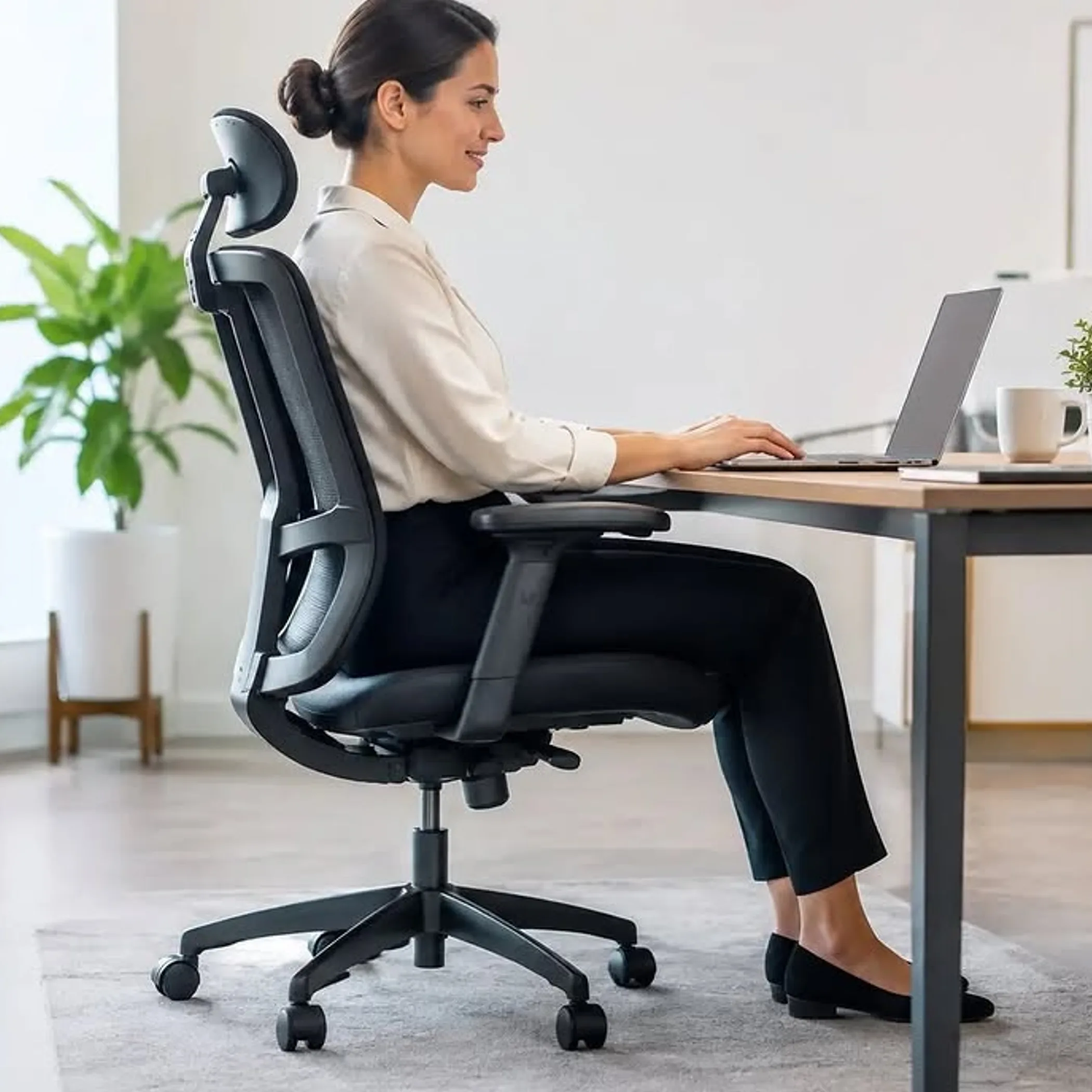 person using ergonomic office chair